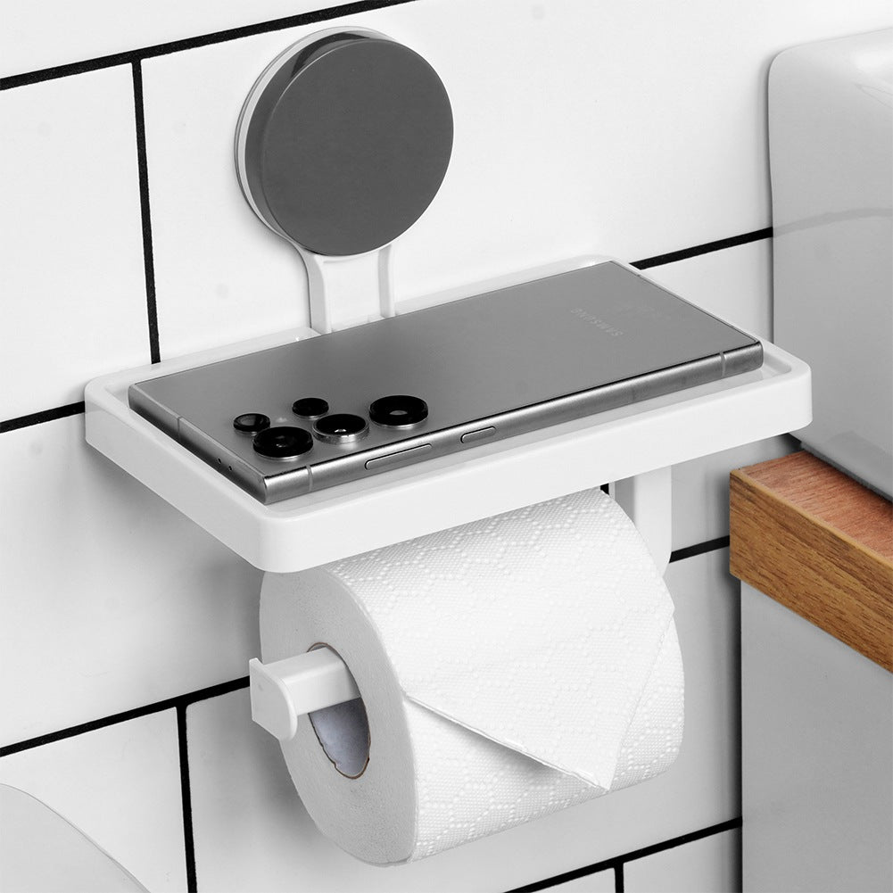 Toilet paper holder with suction cup shelf