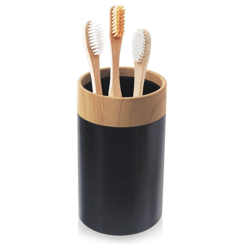 Toothbrush cup in black plastic with wooden details