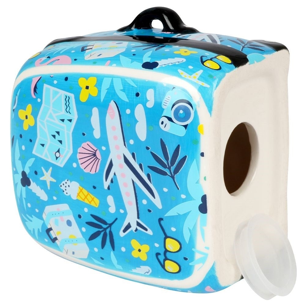 Travel bag-shaped piggy bank in blue ceramic with travel details