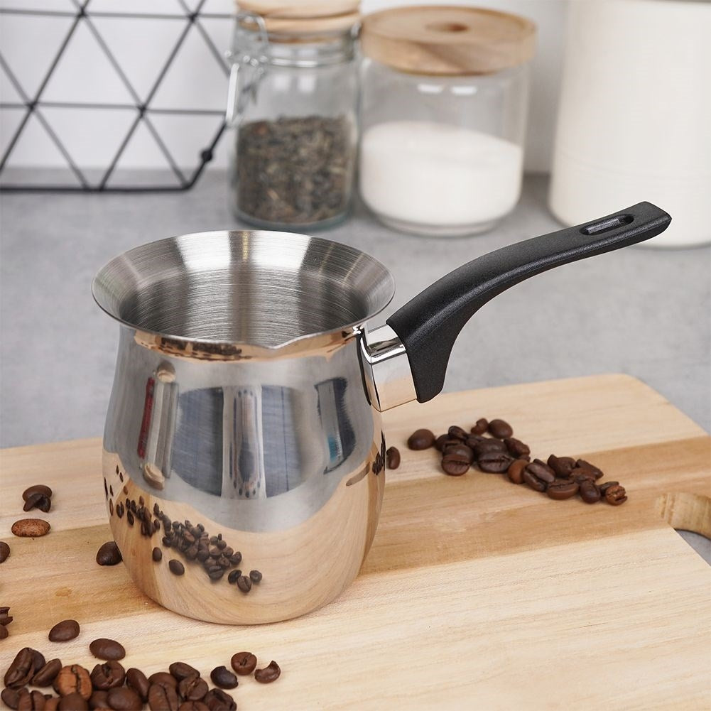 Turkish coffee maker in stainless steel with heat-resistant handle