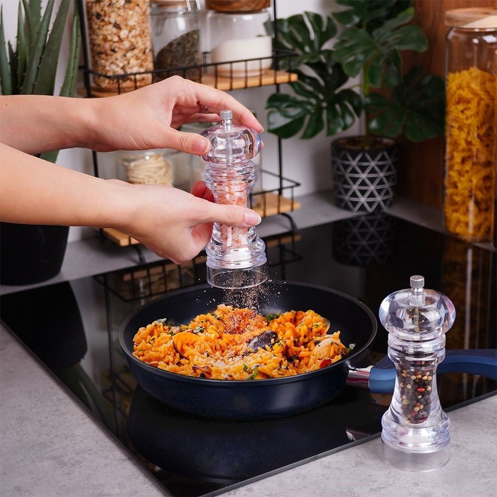 Two acrylic hand grinders for pepper & salt with ceramic grinding