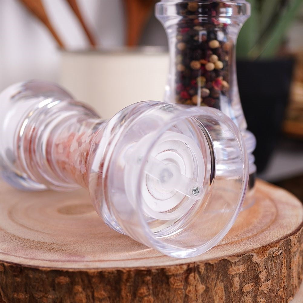 Two acrylic hand grinders for pepper & salt with ceramic grinding