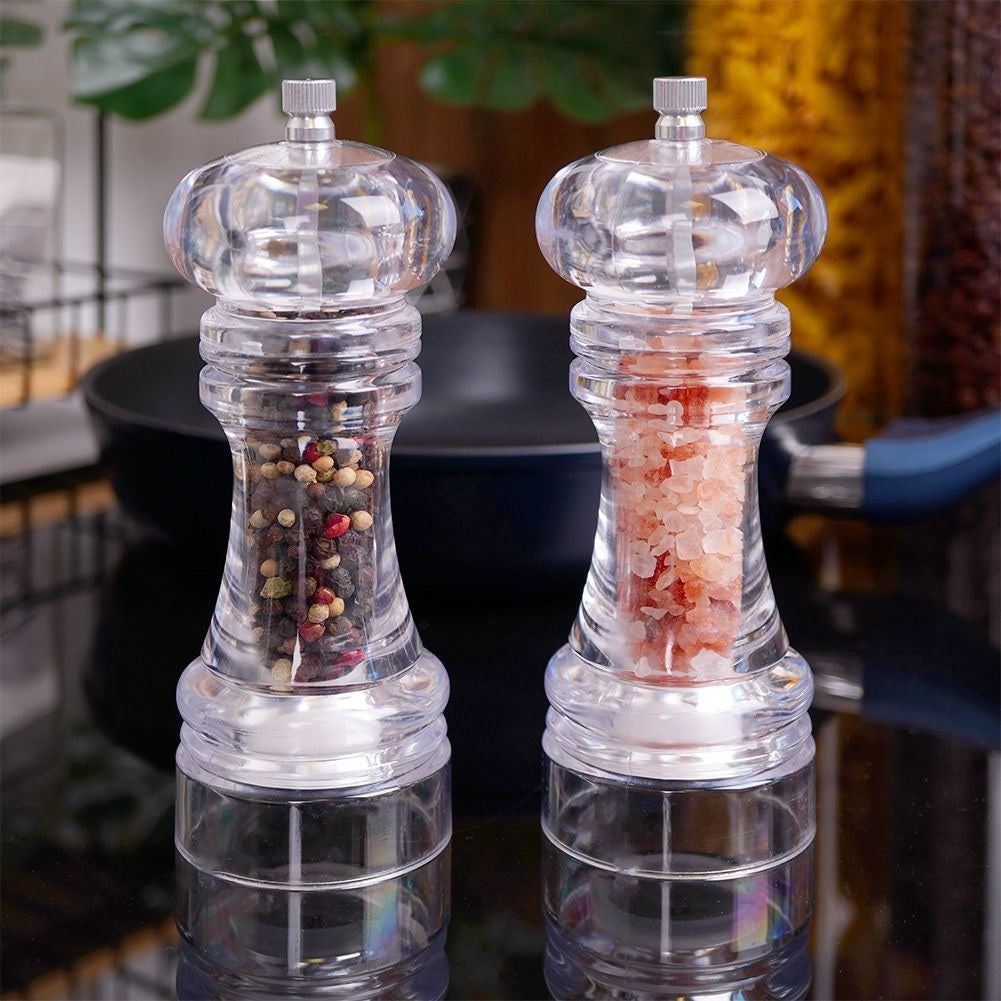 Two acrylic hand grinders for pepper & salt with ceramic grinding