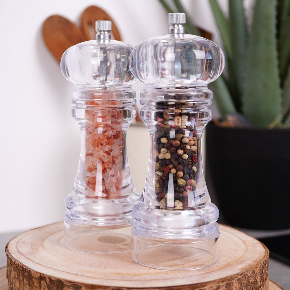 Two acrylic hand grinders for pepper & salt with ceramic grinding