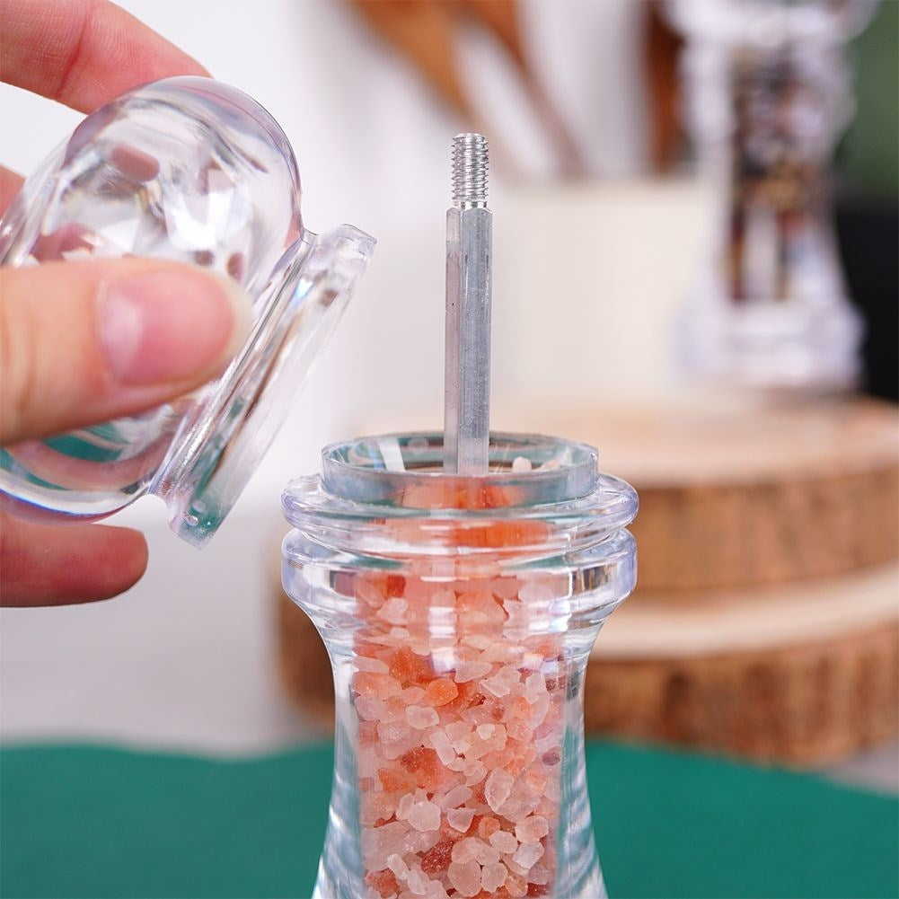 Two acrylic hand grinders for pepper & salt with ceramic grinding
