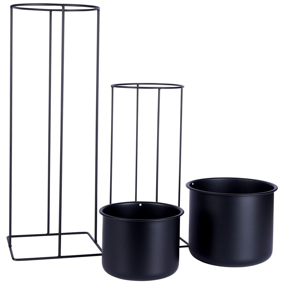 Two black metal pots with stands, different sizes