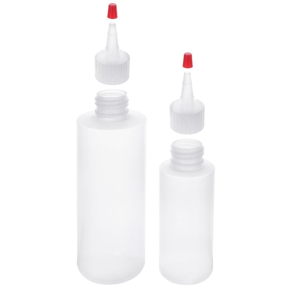 Two bottles for cake decoration, sauce dosage with lid