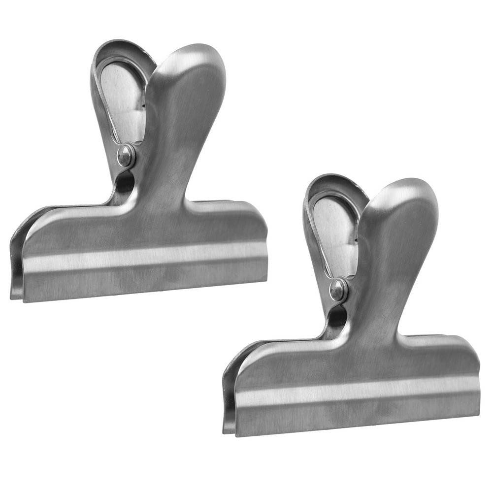 Two stainless steel clamps for tight sealing of bags