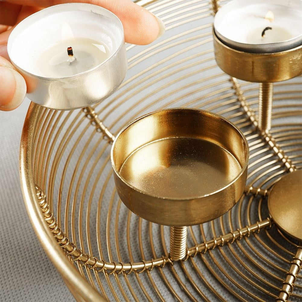 Unique golden candlestick for four bowl-shaped tealights