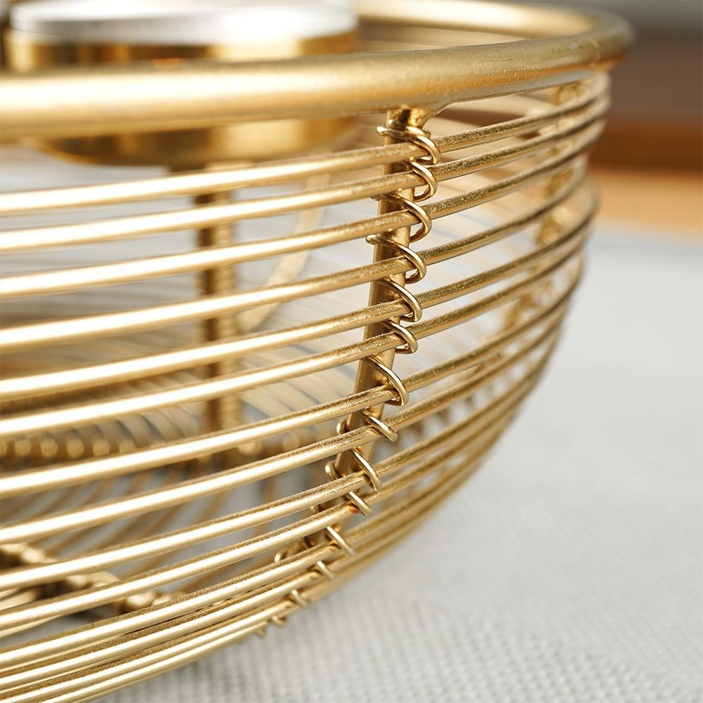 Unique golden candlestick for four bowl-shaped tealights