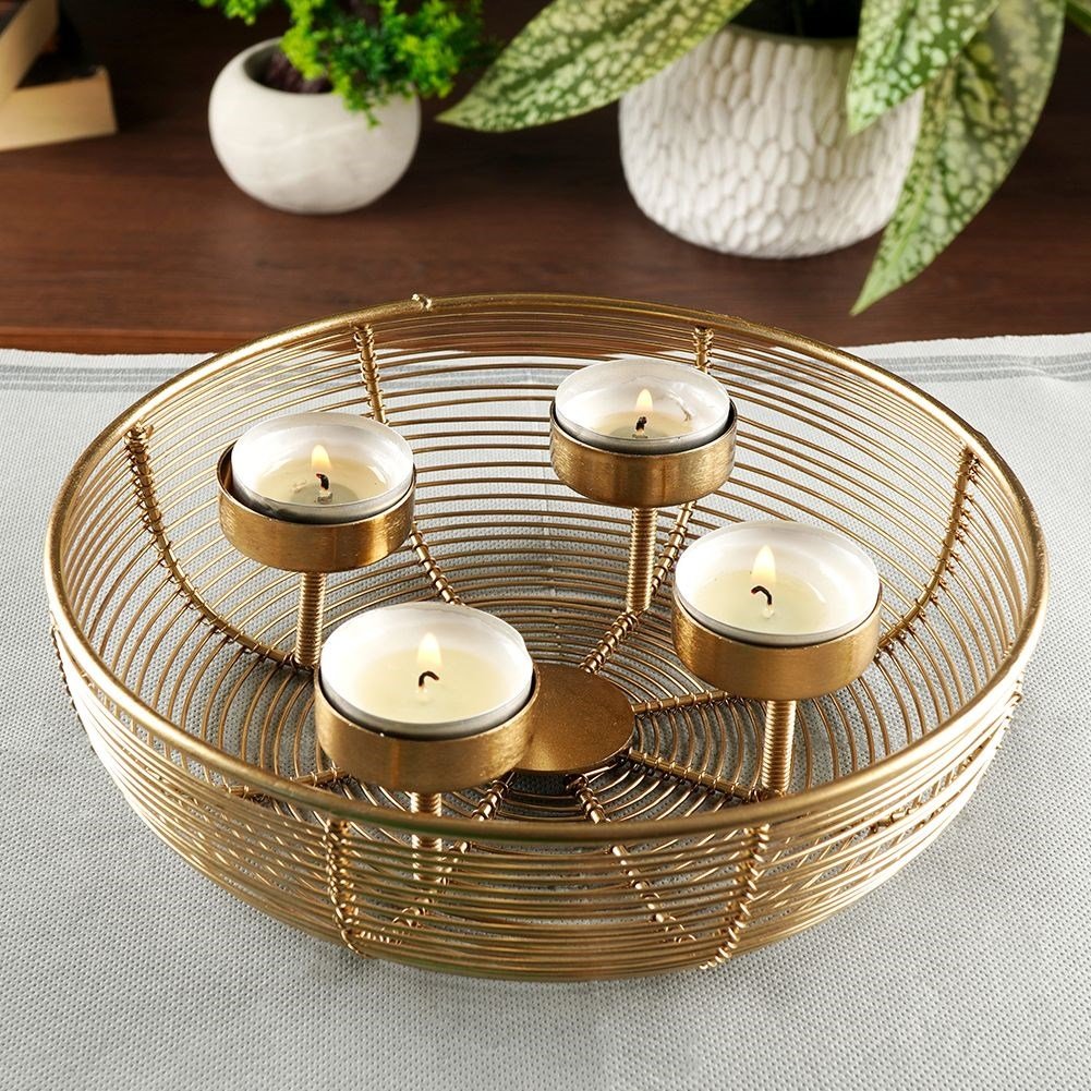 Unique golden candlestick for four bowl-shaped tealights