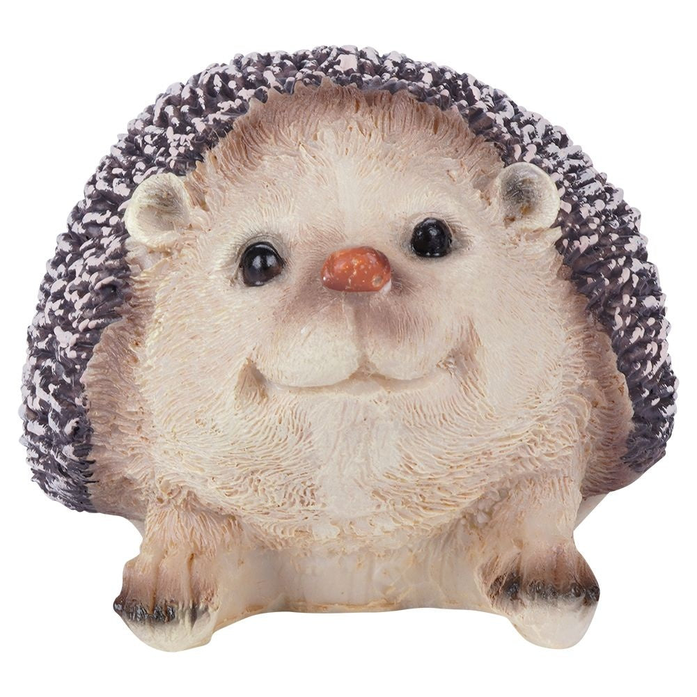 Unique hedgehog figure in synthetic stone for garden