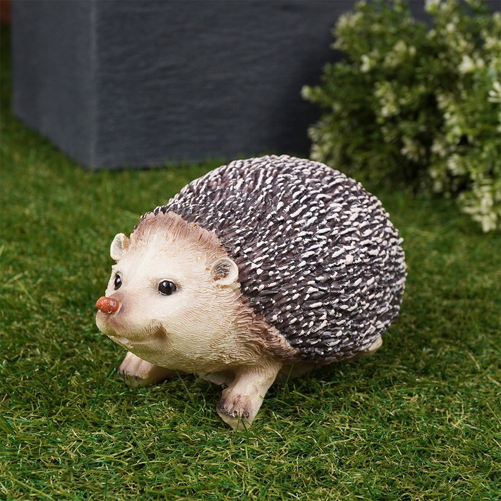 Unique hedgehog figure in synthetic stone for garden