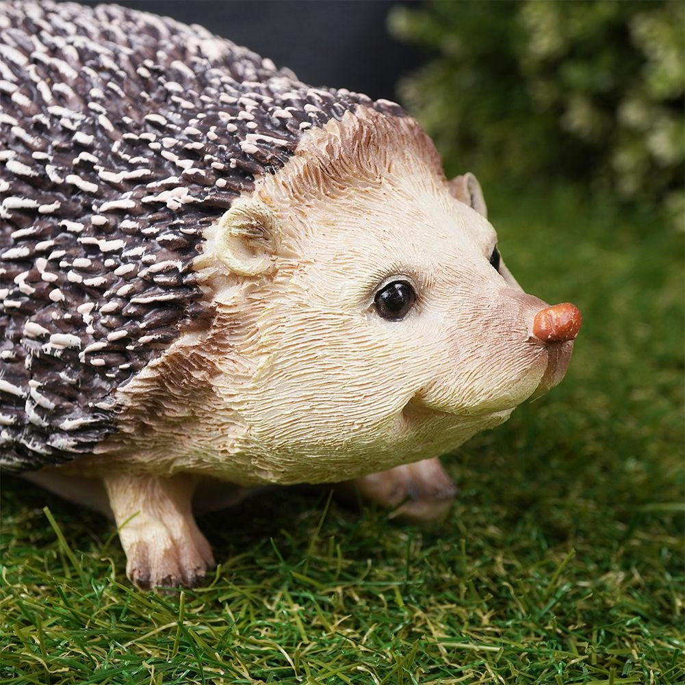 Unique hedgehog figure in synthetic stone for garden