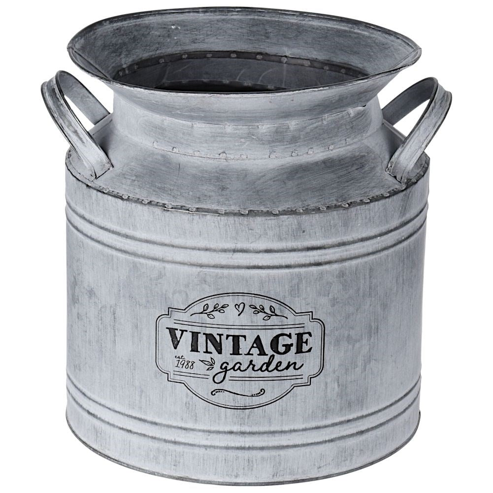 Unique metal jug: Decorative flower pot or vase for the garden