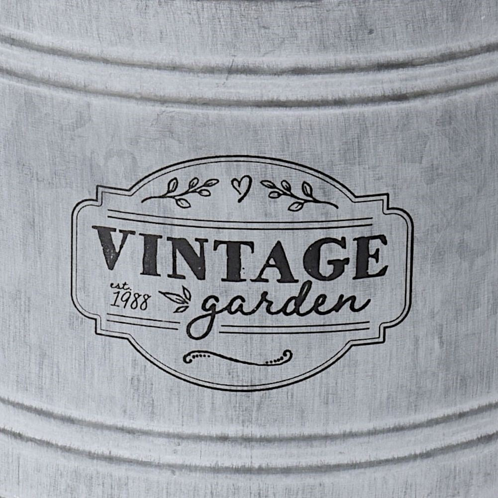 Unique metal jug: Decorative flower pot or vase for the garden