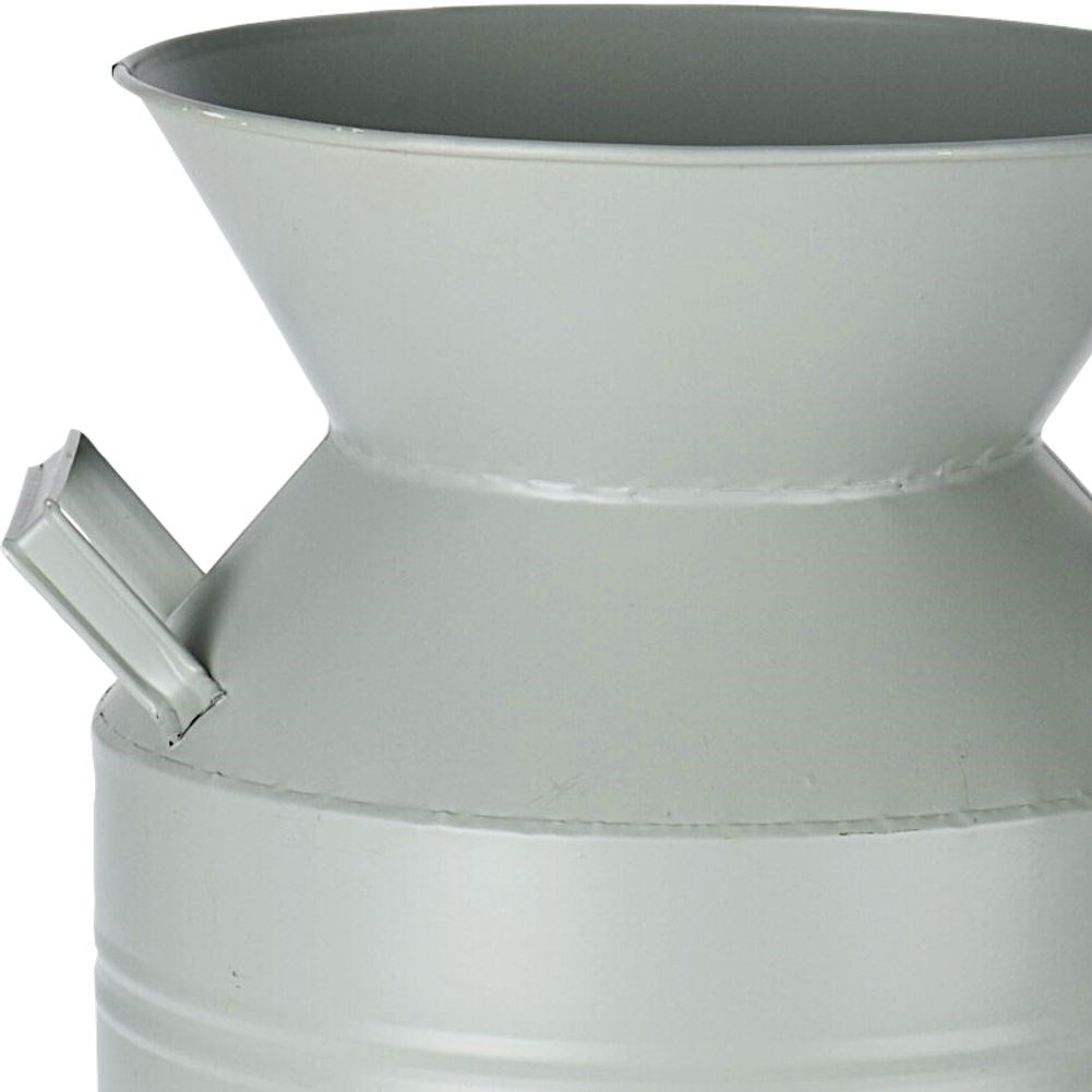 Unique metal jug for garden, terrace or balcony