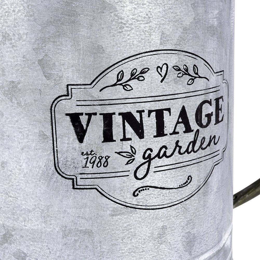 Unique metal watering can for garden decoration and flower arrangements
