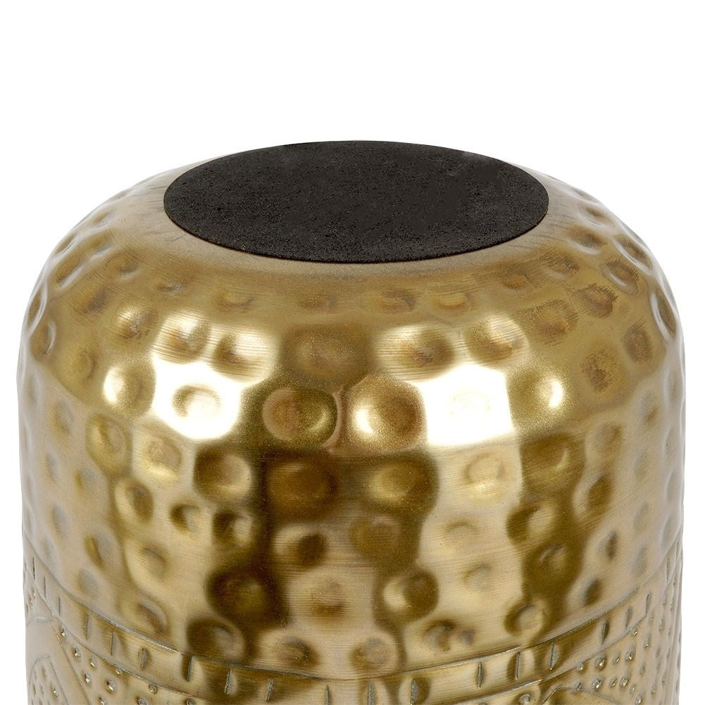 Unique plant pot in hammered brass with an eye-catching design