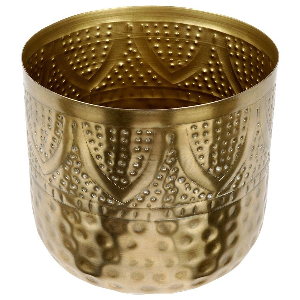 Unique plant pot in hammered brass with an eye-catching design
