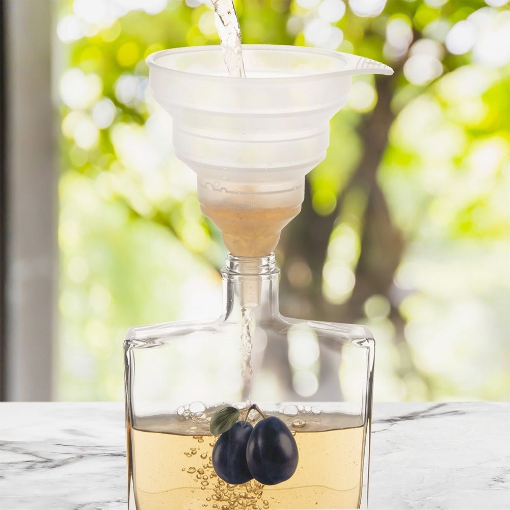 Universal collapsible silicone funnel with measuring function for the kitchen