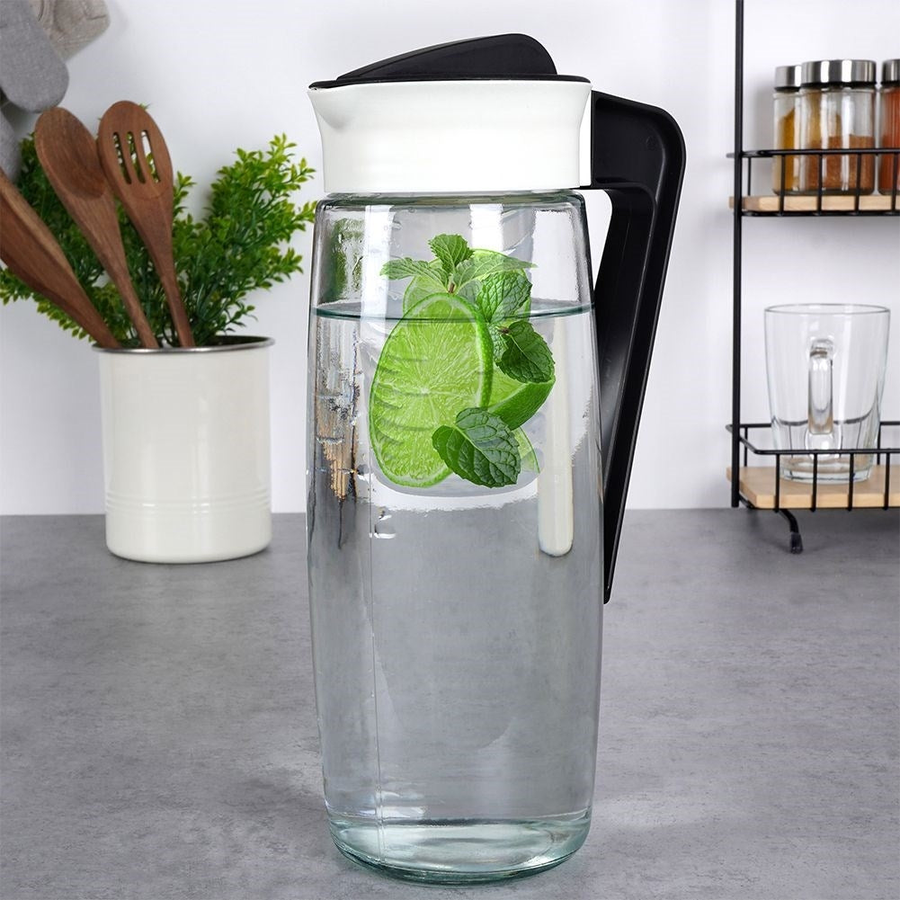 Universal glass jug with lid and fruit insert for drinks