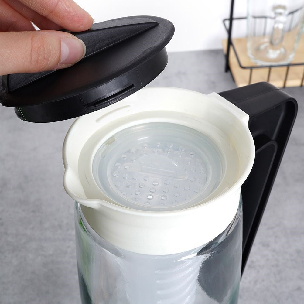 Universal glass jug with lid and fruit insert for drinks