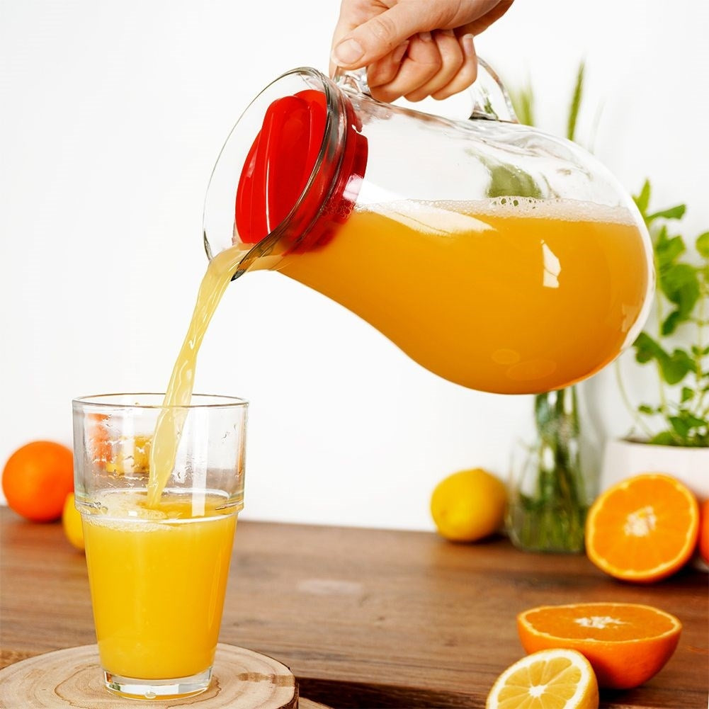 Universal glass jug with lid, spout and comfortable handle