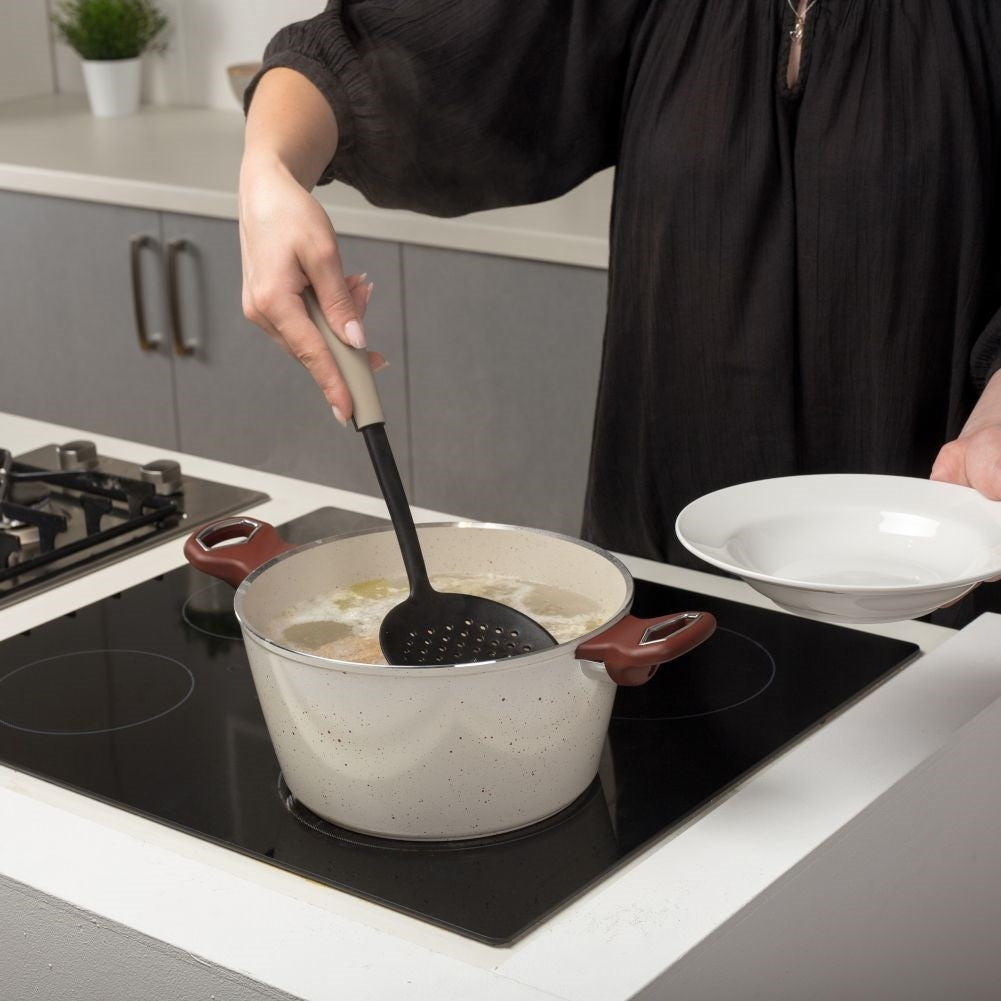 Universal kitchen ladle for pasta, dumplings and dumplings.