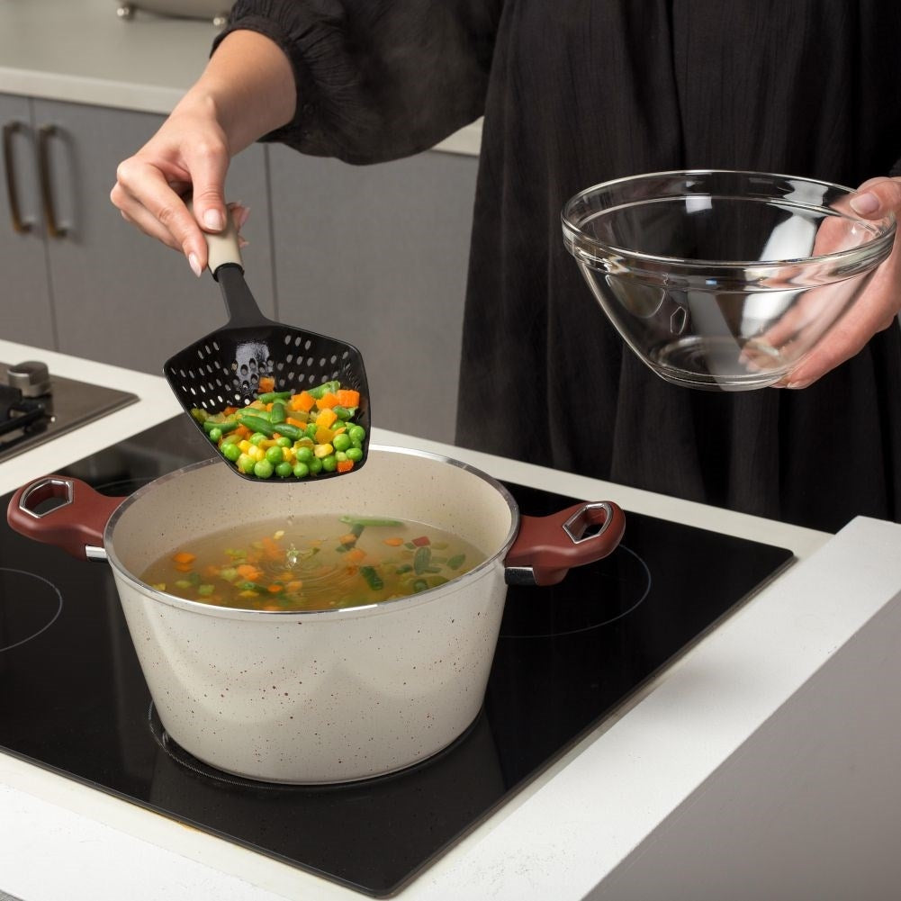 Universal kitchen spoon for pasta, dumplings and potato balls