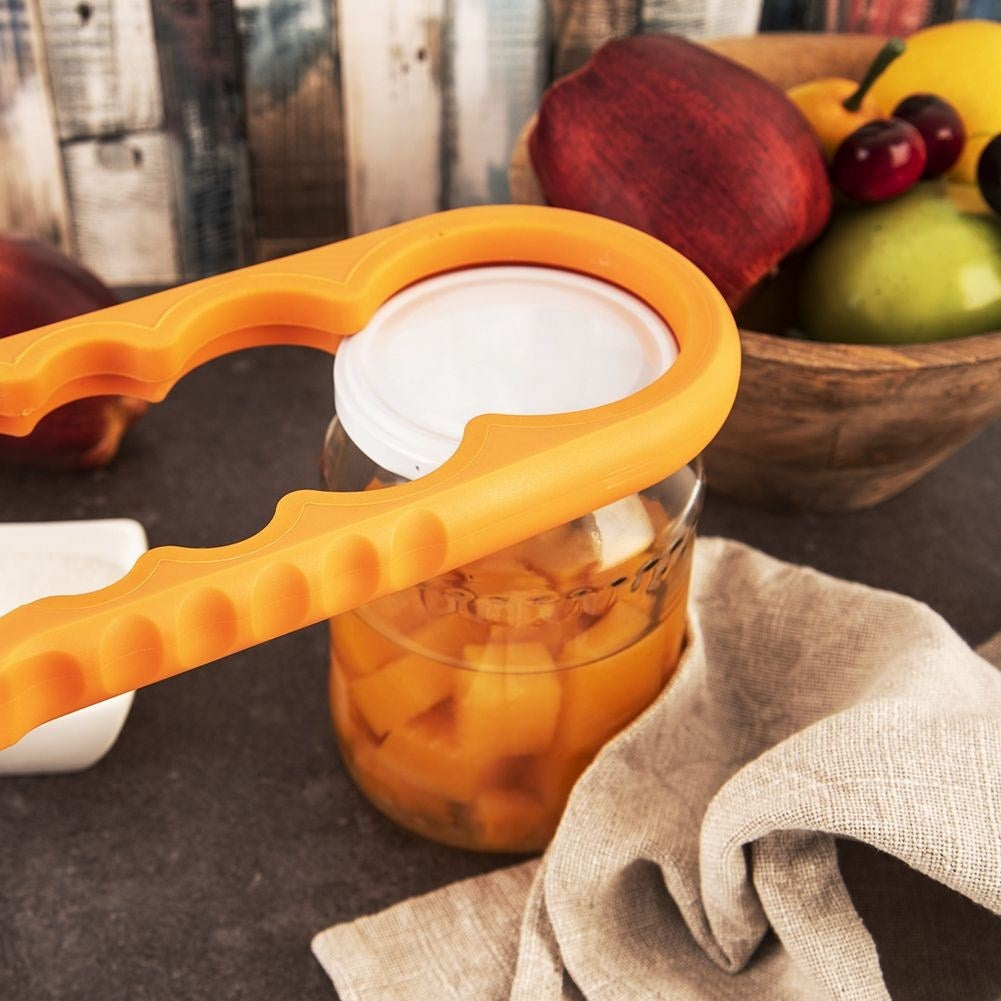 Universal opener for bottles and can lids in various sizes