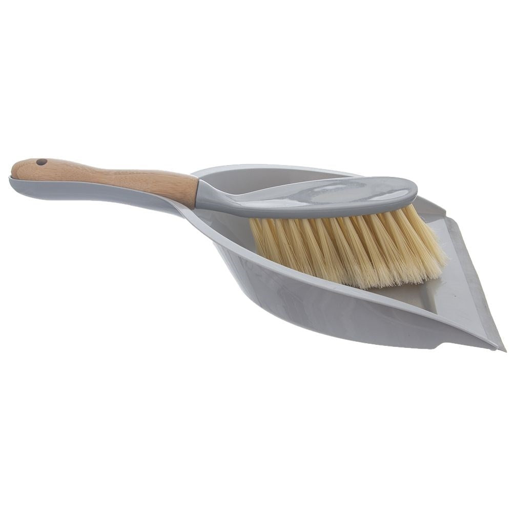 Vacuum cleaner with dustpan for all surfaces and particles