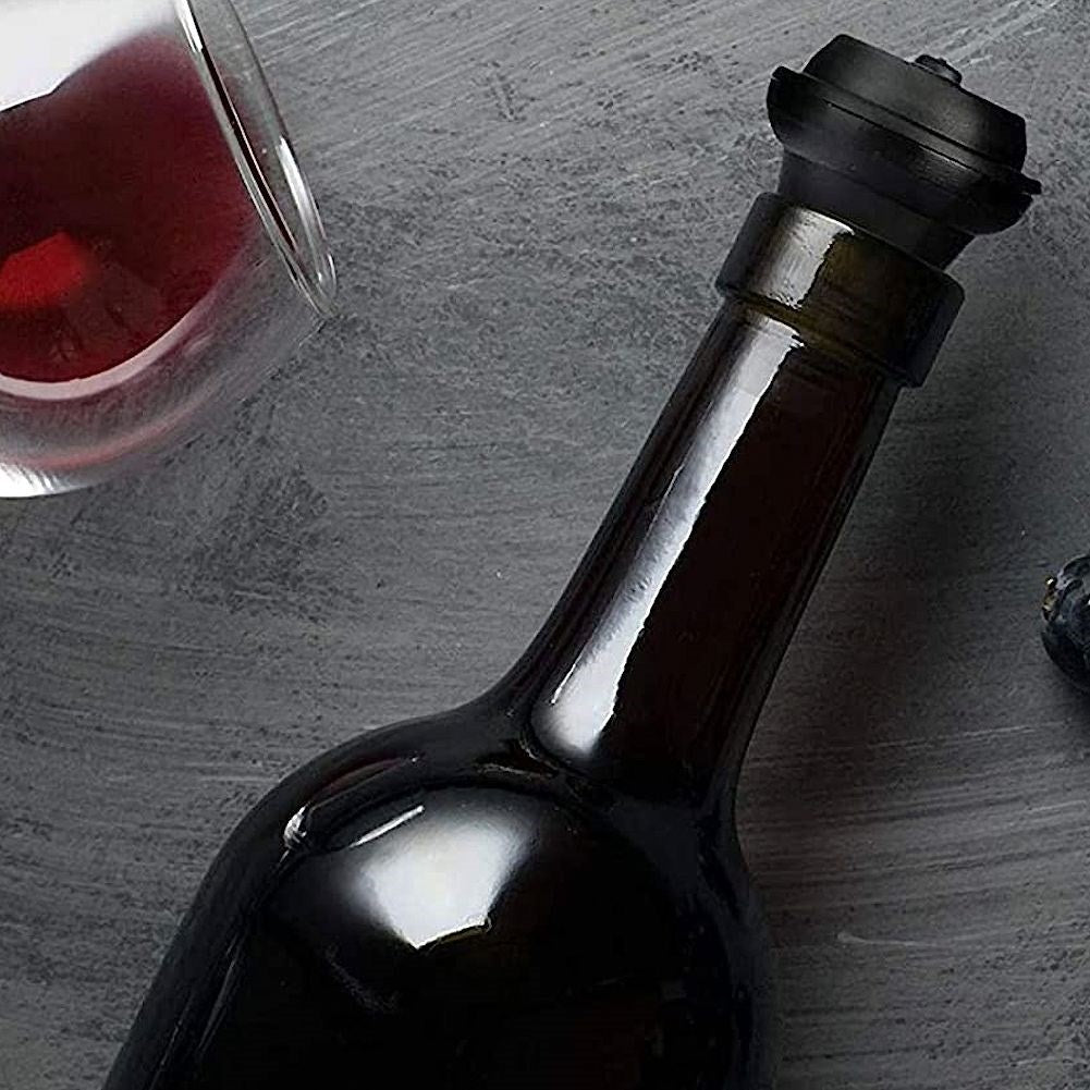 Vacuum pump with two bottle caps for wine preservation