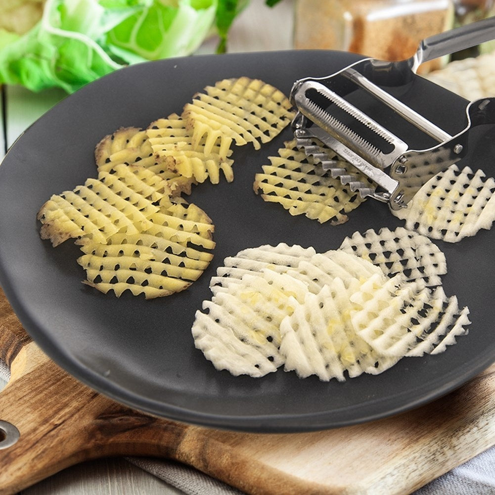 Vegetable peeler with double blades for patterns and slices