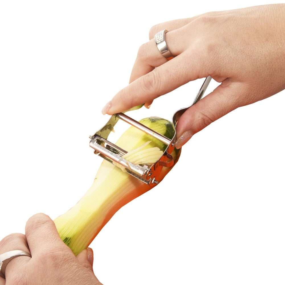Vegetable peeler with double blades for peeling and shredding