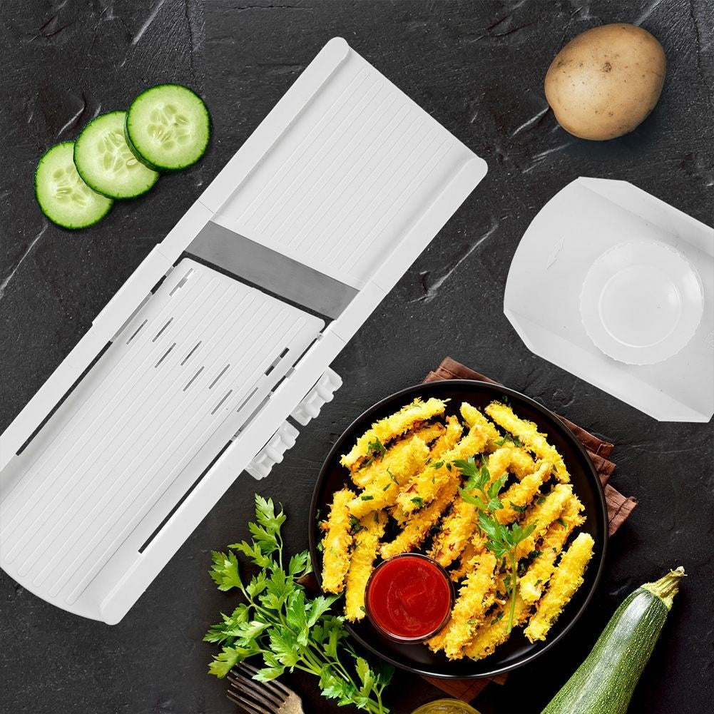 Vegetable slicer with adjustable thickness and stainless steel blades