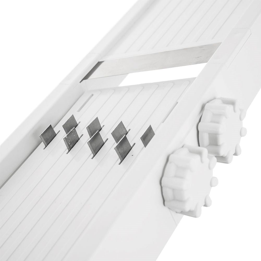 Vegetable slicer with adjustable thickness and stainless steel blades