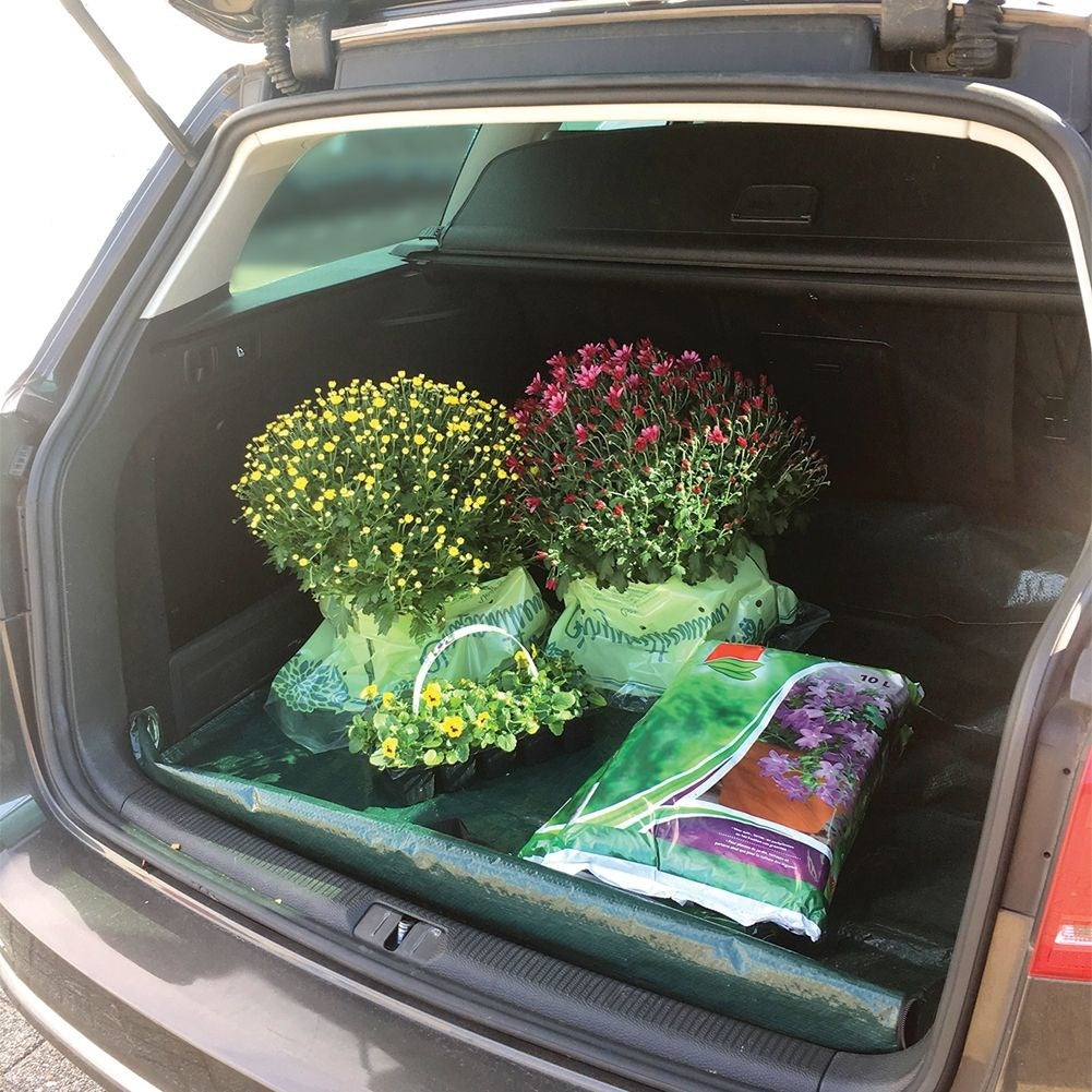 Versatile bag: Leaf bag & protective mat for the car's luggage.