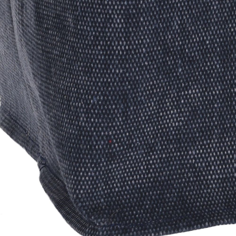 Versatile canvas-made basket for storing small items.