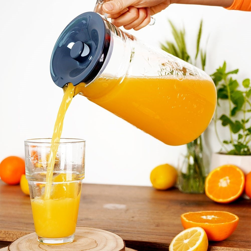 Versatile glass jug with lid and spout for drinks
