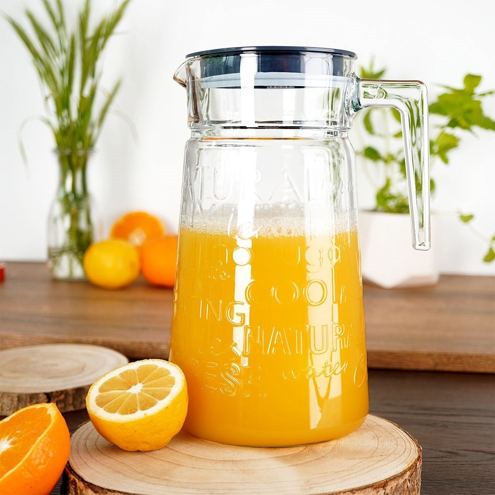 Versatile glass jug with lid and spout for drinks