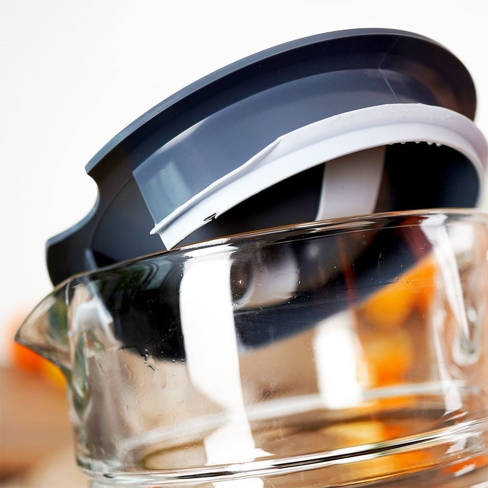 Versatile glass jug with lid and spout for drinks