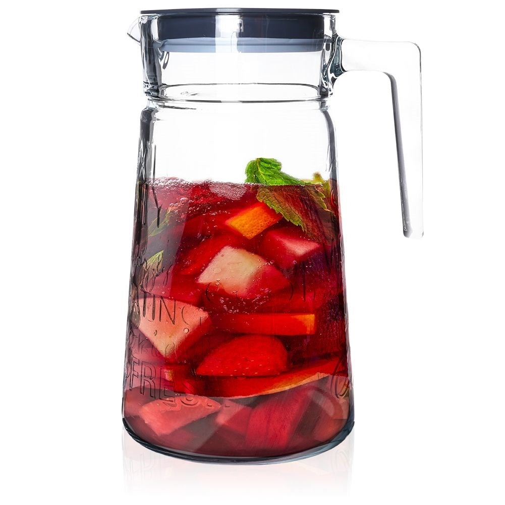 Versatile glass jug with lid and spout for drinks