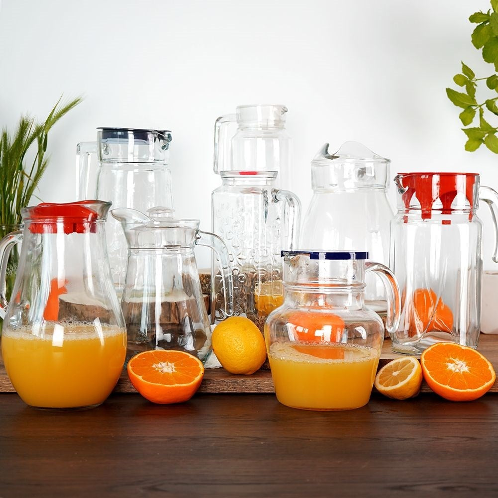 Versatile glass jug with lid, spout and comfortable handle