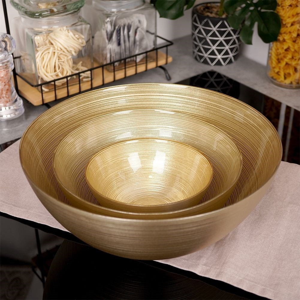 Versatile golden glass bowl for salad and snacks