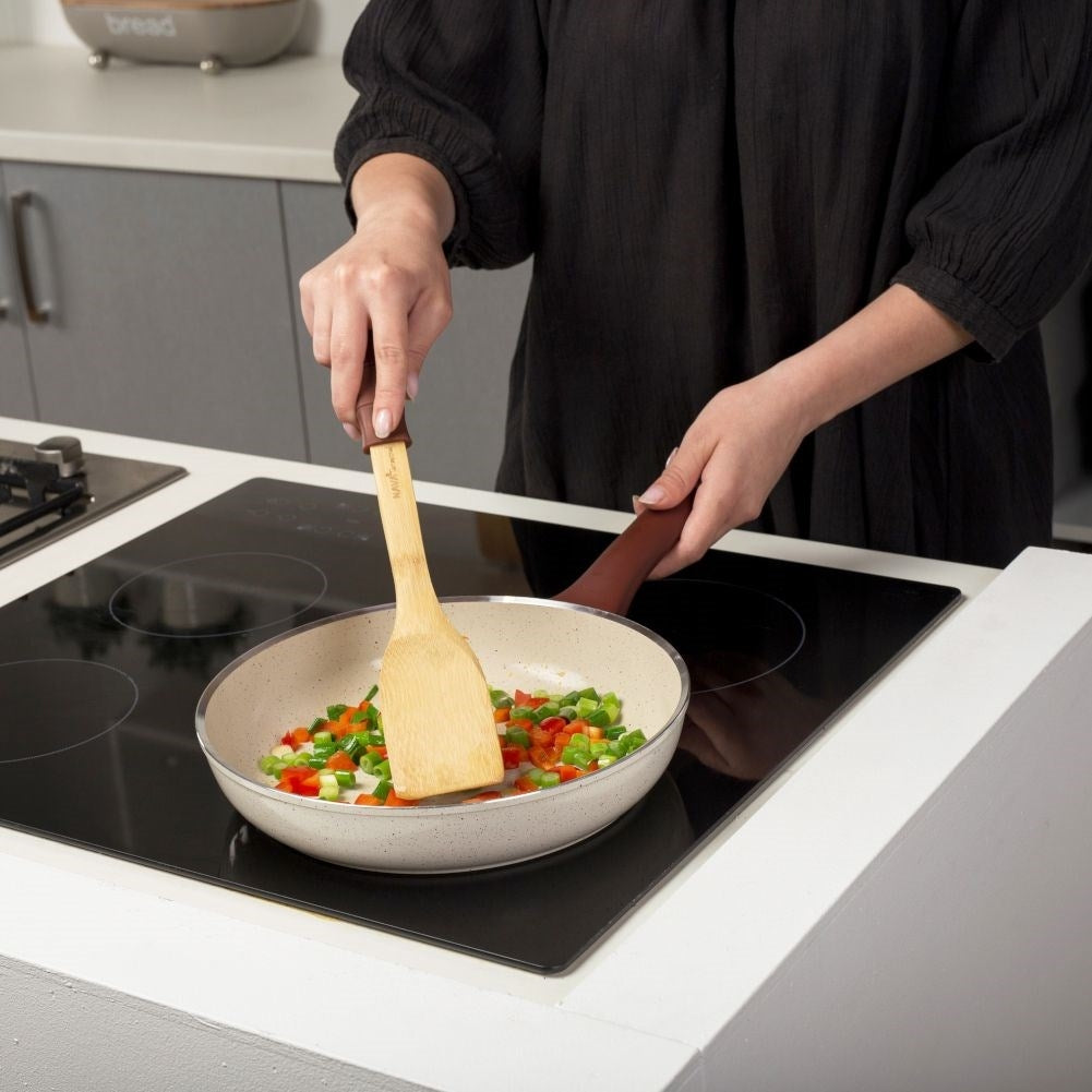 Versatile kitchen utensils in bamboo and silicone