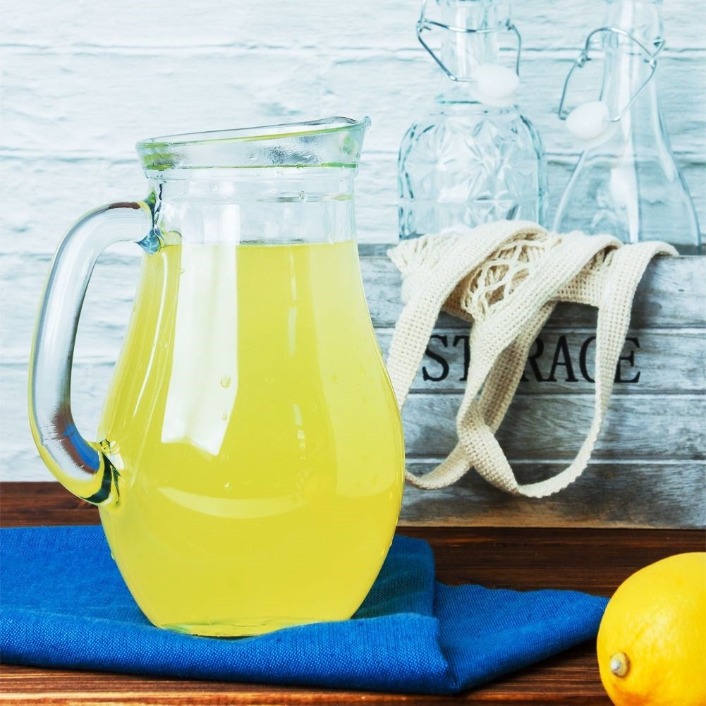 Versatile pitcher for water, juice, lemonade, iced tea and compote