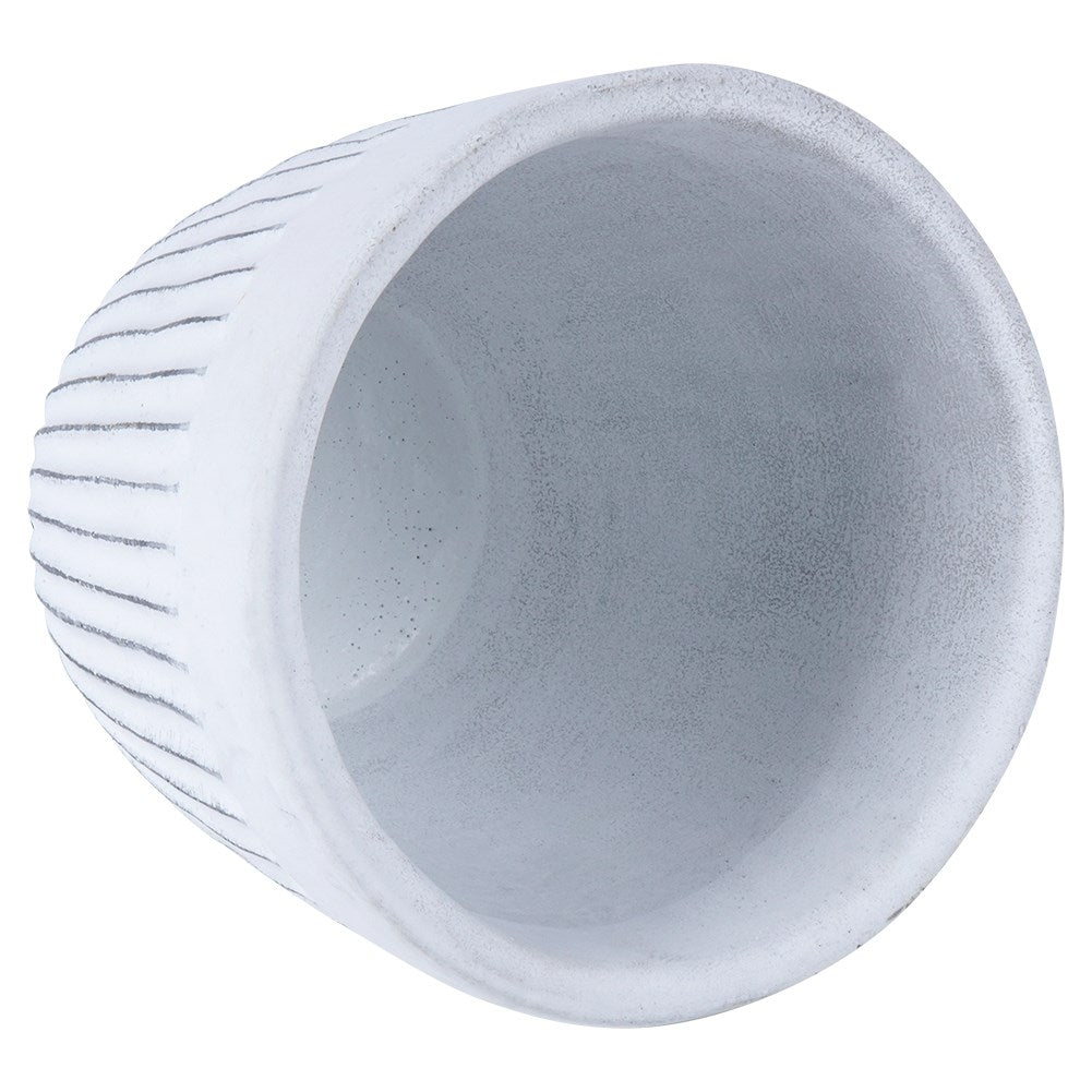 Vintage flower pot in white ceramic with worn effects.