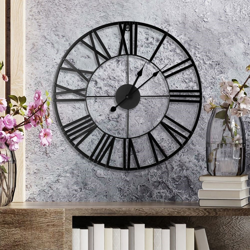 Wall clock in black metal with Roman numerals for loft
