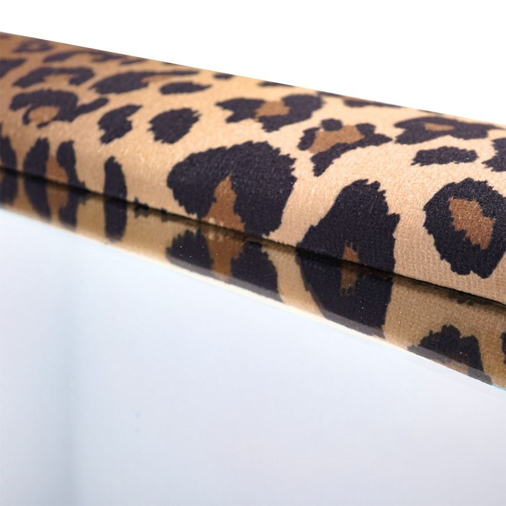 Wall mirror in wooden frame with velvet and leopard pattern